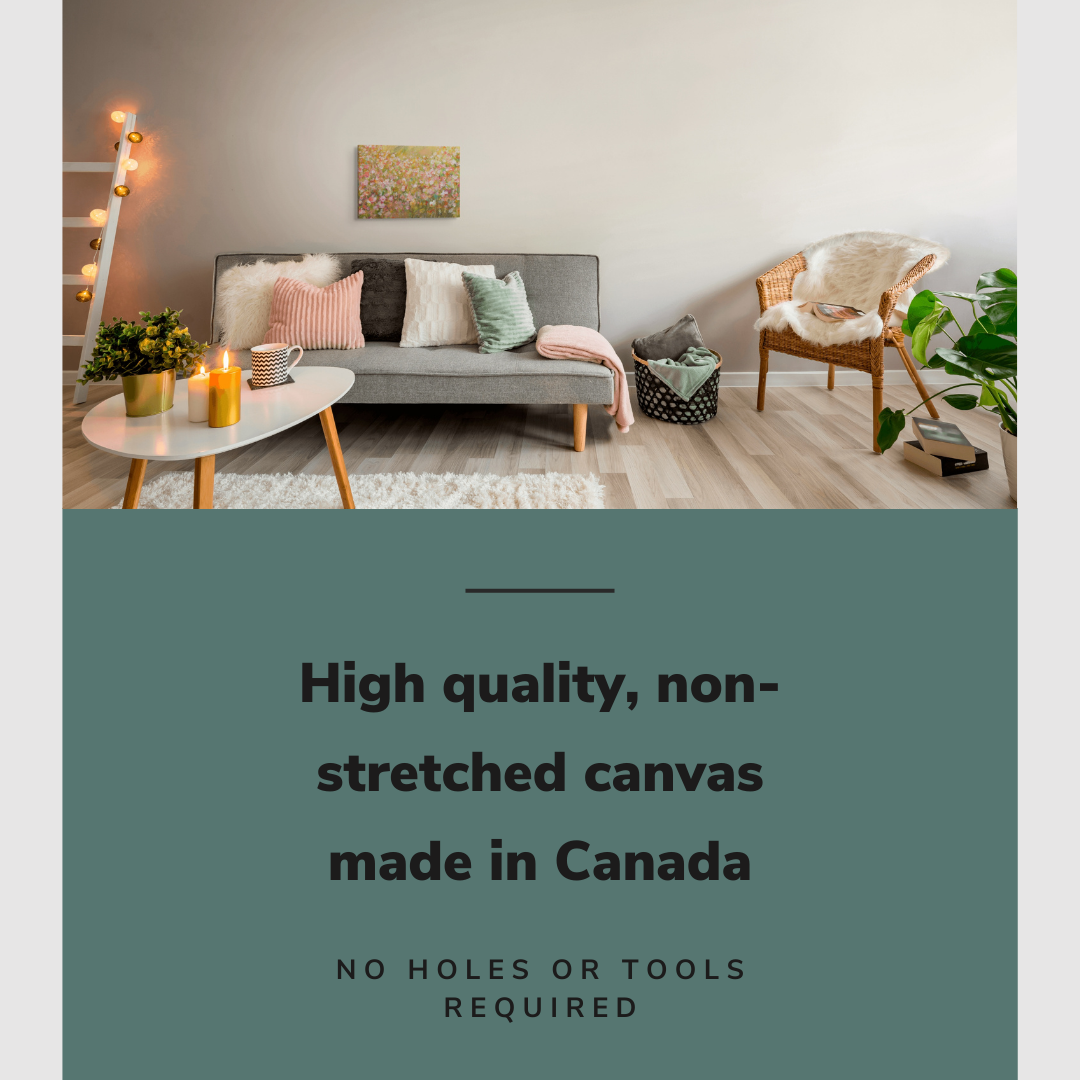 Lifestyle image of the vertical, 12x18 inch easy to hang canvas wall art hung in in a modern living room hung above a couch with a spring colored pillows with graphic saying "High quality, non-stretched canvas made in Canada"