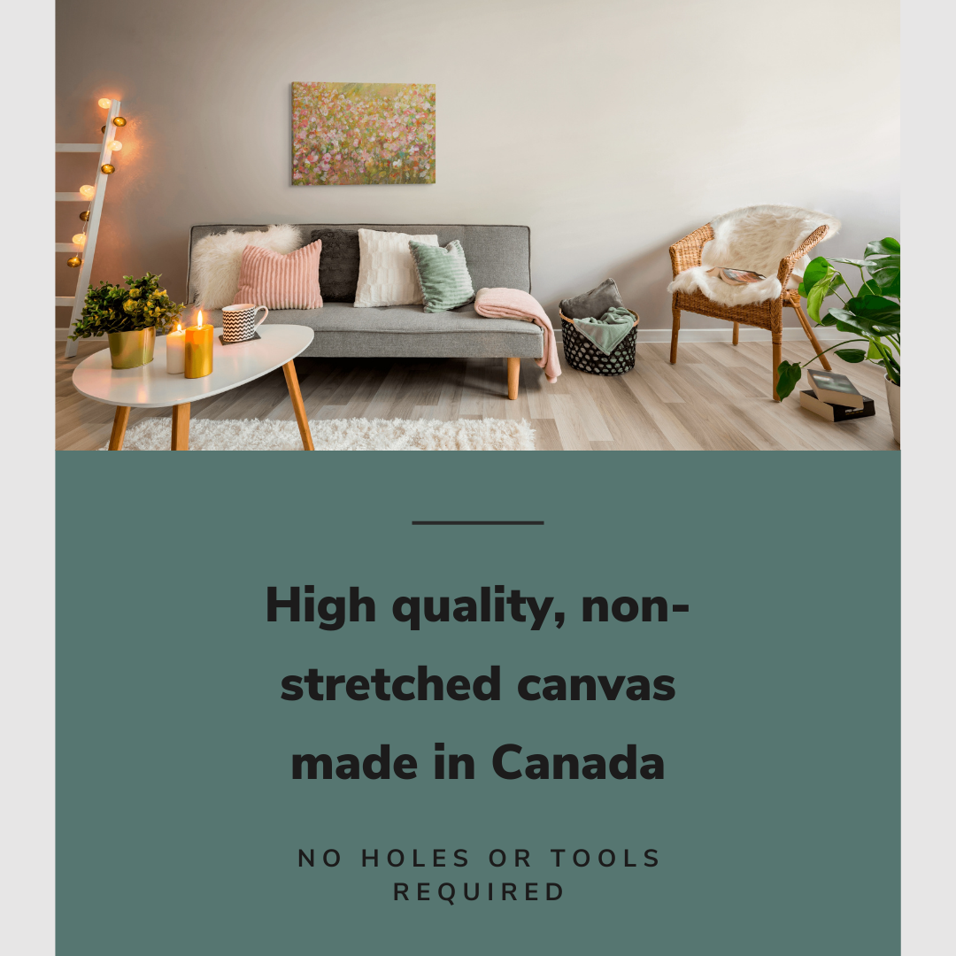 Lifestyle image of the vertical, 20x30 inch easy to hang canvas wall art hung in in a modern living room hung above a couch with a spring colored pillows with graphic saying "High quality, non-stretched canvas made in Canada"