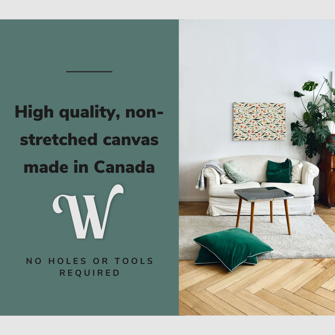 Lifestyle image of the vertical, 20x30 inch easy to hang canvas wall art hung in in a modern living room hung above a couch with a forest green pillow with graphic saying "High quality, non-stretched canvas made in Canada"