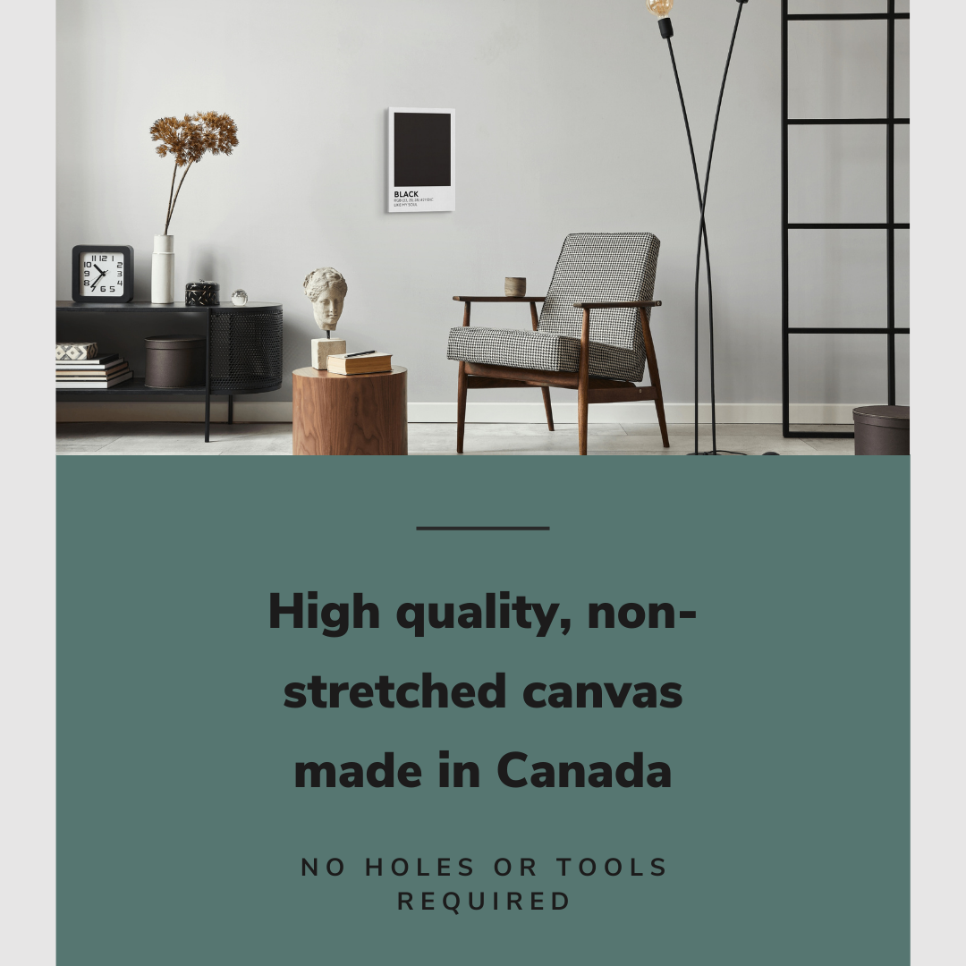 Lifestyle image of the vertical, 12x18 inch easy to hang canvas wall art hung in a living room above an accent chair and side table with graphic saying "High quality, non-stretched canvas made in Canada"