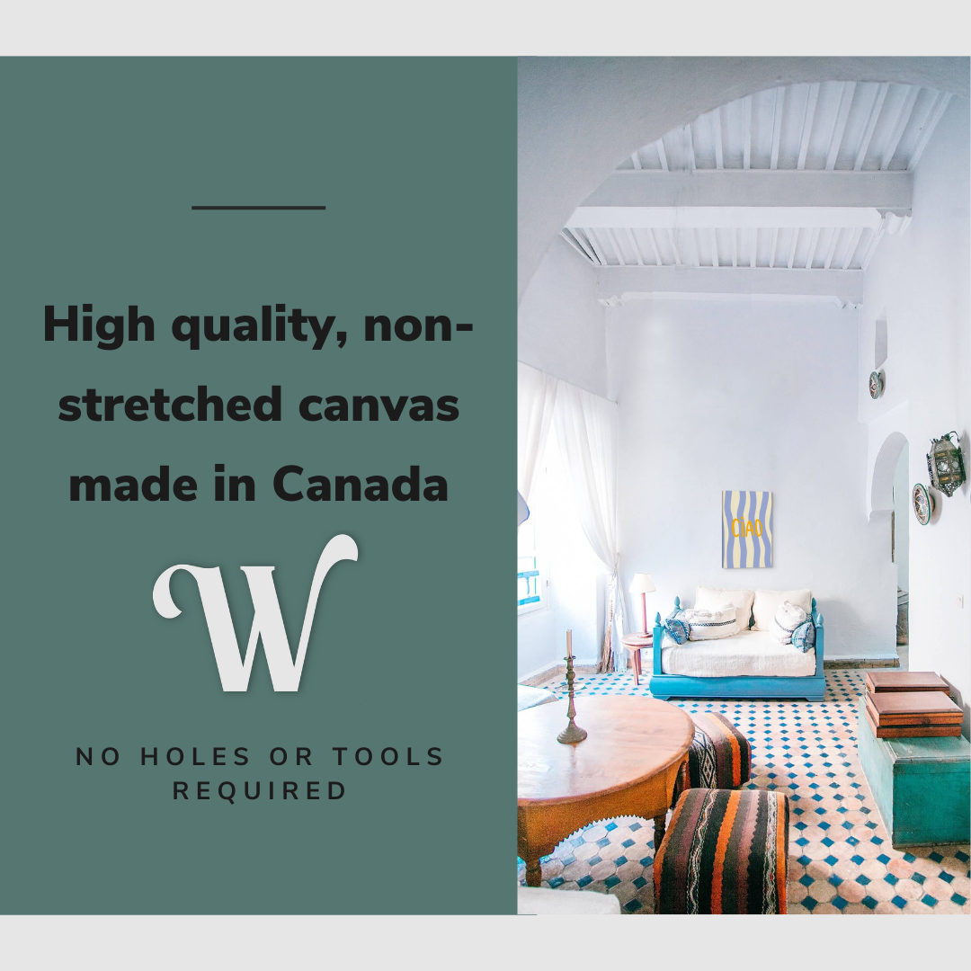 Lifestyle image of the vertical 16x24" inch easy to hang canvas wall art hung in a living room dining room space above a couch overlooking tables with graphic saying "High quality, non-stretched canvas made in Canada"