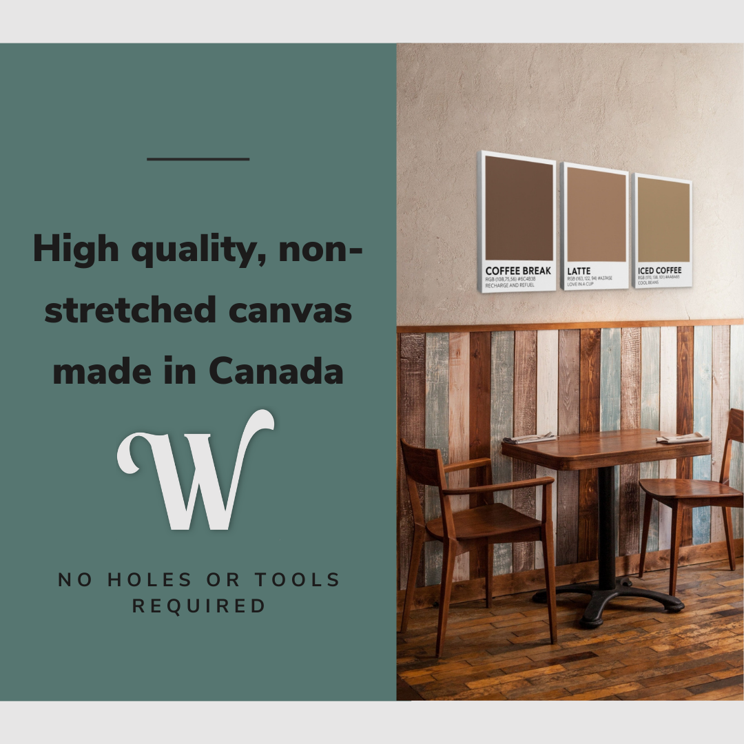Lifestyle image of the vertical, 24x48 inch easy to hang canvas wall art hung in a kitchen over a small dining room table with graphic saying "High quality, non-stretched canvas made in Canada"
