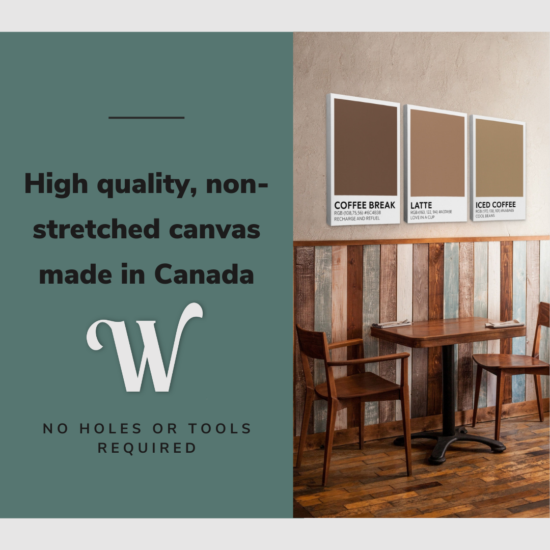 Lifestyle image of the vertical, 30x60 inch easy to hang canvas wall art hung in a kitchen over a small dining room table with graphic saying "High quality, non-stretched canvas made in Canada"