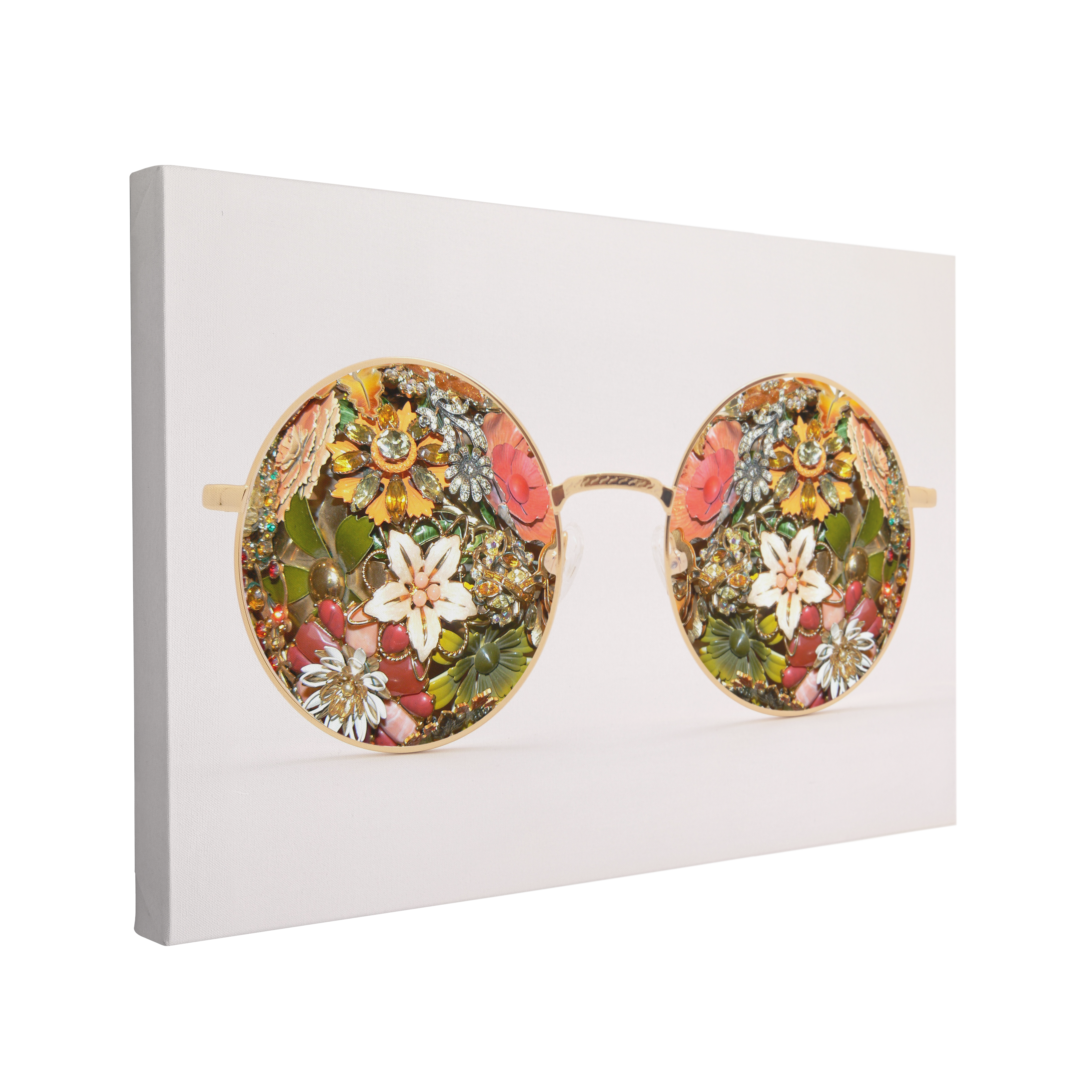 single, 2:3 horizontal easy to hang canvas print on a transparent background featuring an image of an image of vintage, retro gold sunglasses on a light grey background with flowers and shiny gems in the frames
