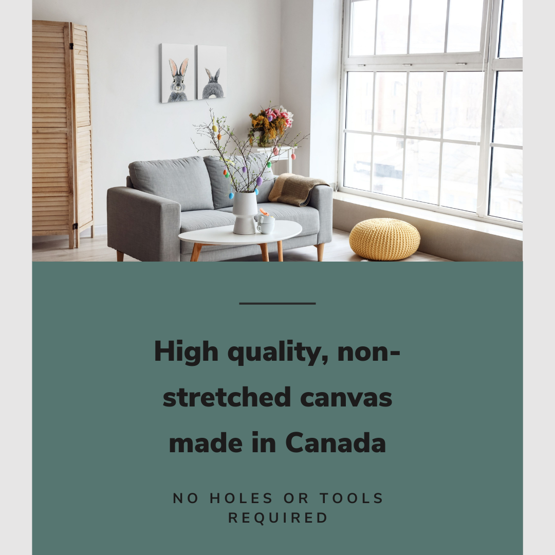 Lifestyle image of the vertical, 18x24 inch easy to hang canvas wall art hung in hung in a minimalist easter decorated living room above the couch with graphic saying "High quality, non-stretched canvas made in Canada"