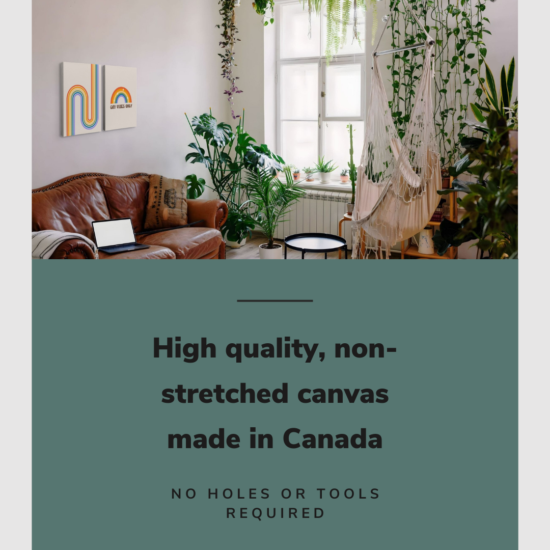 Lifestyle image of the vertical, 18x24 inch easy to hang canvas wall art hung in a maximalist living room with lots of plants hung above a couch with graphic saying "High quality, non-stretched canvas made in Canada"