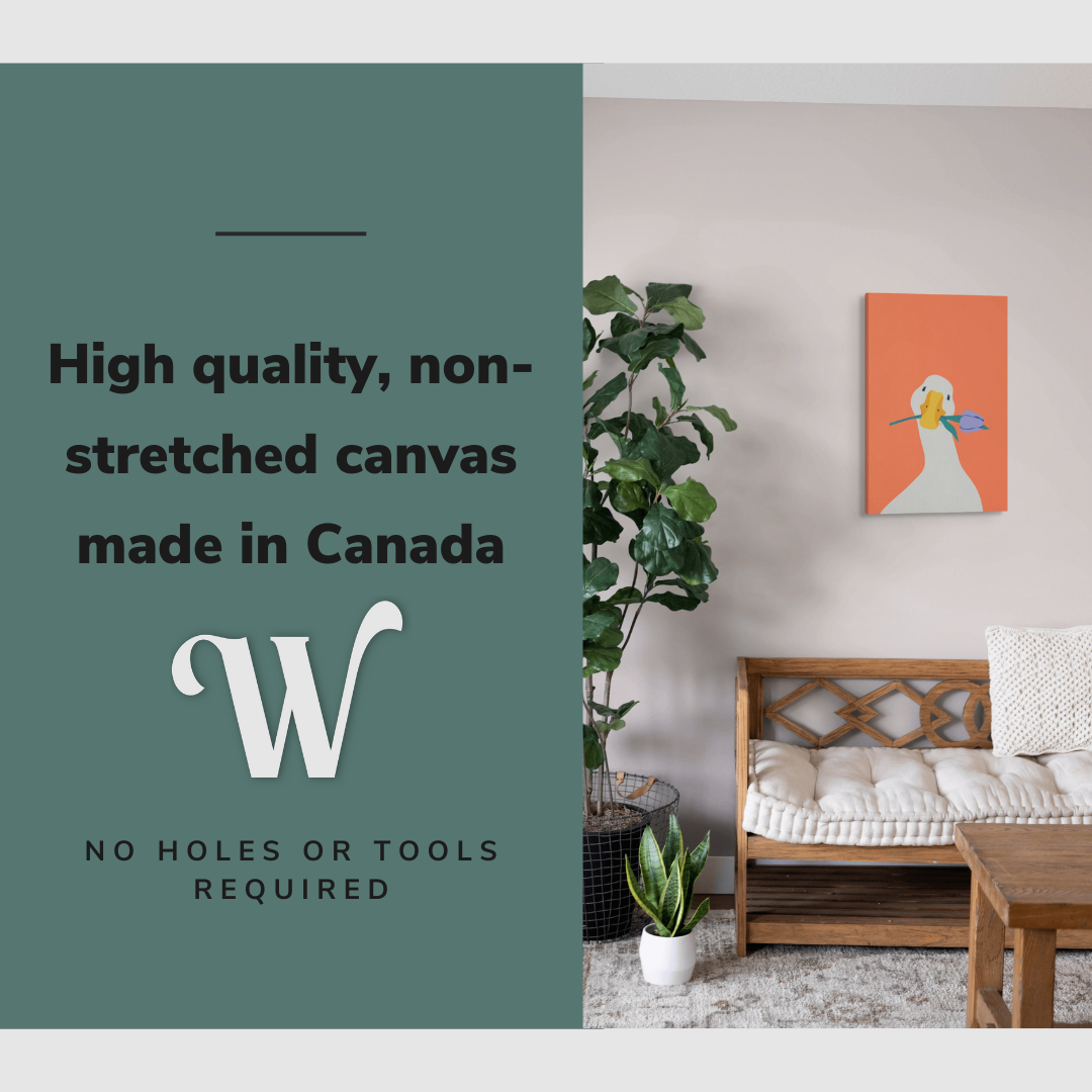 Lifestyle image of the vertical, 16x24 inch easy to hang canvas wall art hung in hung in a minimalist living room above a couch with graphic saying "High quality, non-stretched canvas made in Canada"