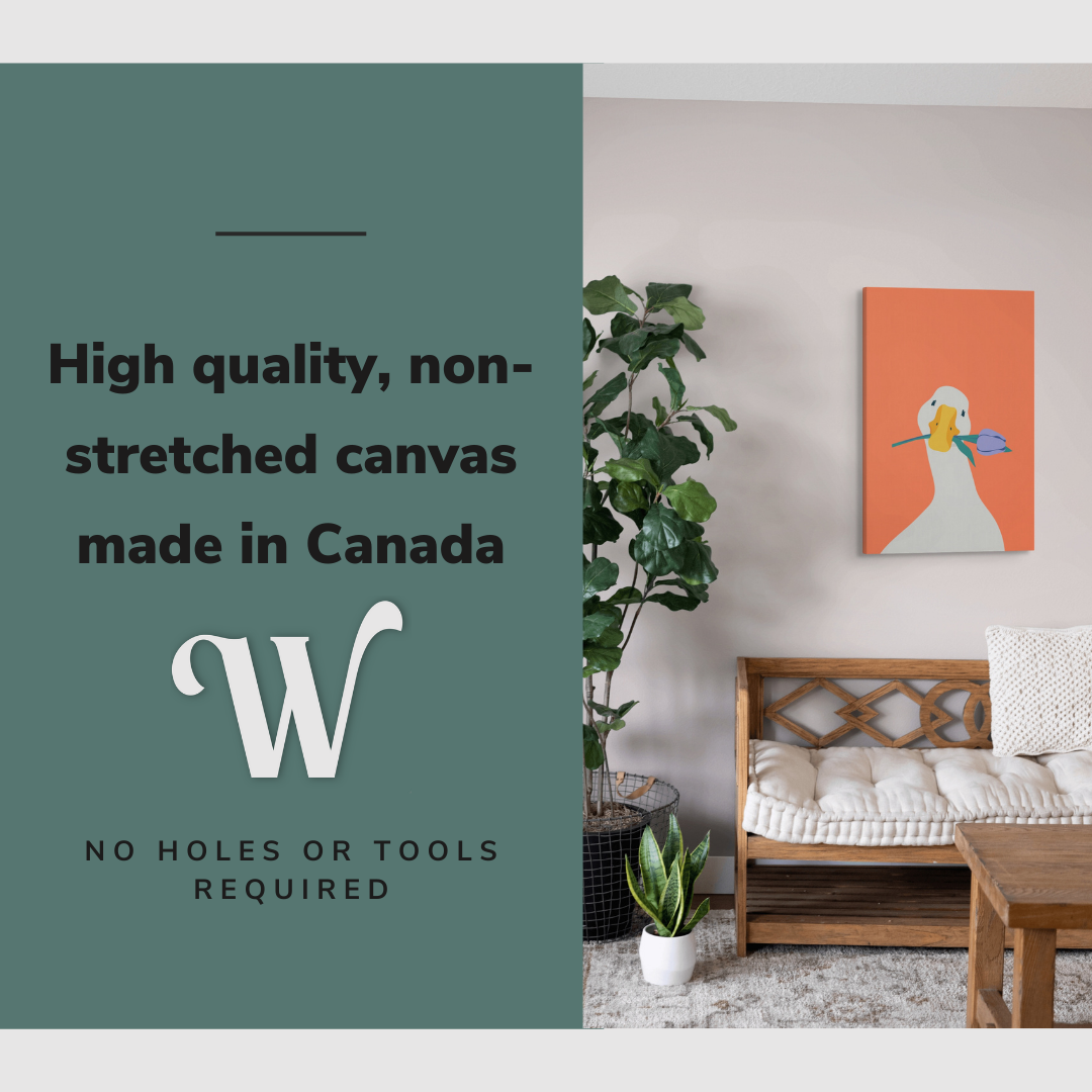 Lifestyle image of the vertical, 20x30 inch easy to hang canvas wall art hung in hung in a minimalist living room above a couch with graphic saying "High quality, non-stretched canvas made in Canada"