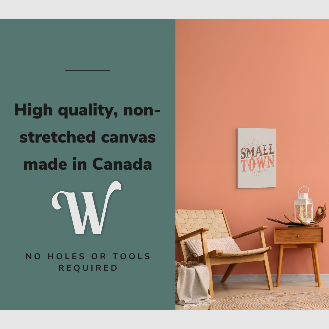 Lifestyle image of the vertical 16x24” inch easy to hang canvas wall art hung in a living room above a chair and table with graphic saying "High quality, non-stretched canvas made in Canada."