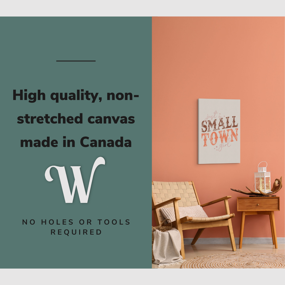Lifestyle image of the vertical, 20x30” inch easy to hang canvas wall art hung in living room above a chair and table with graphic saying "High quality, non-stretched canvas made in Canada"