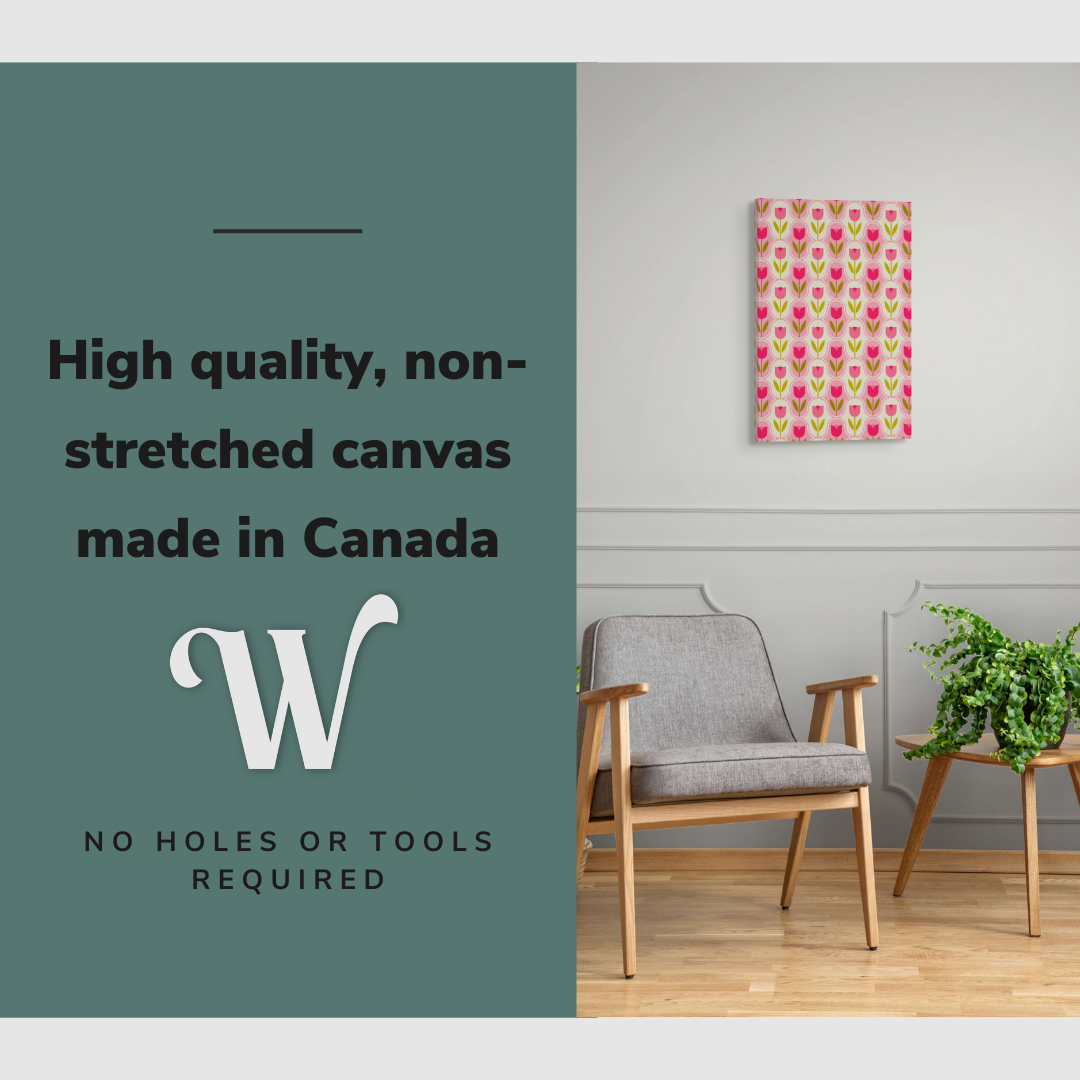 Lifestyle image of the vertical, 16x24 inch easy to hang canvas wall art hung in hung in a minimalist living room above an accent chair with graphic saying "High quality, non-stretched canvas made in Canada"