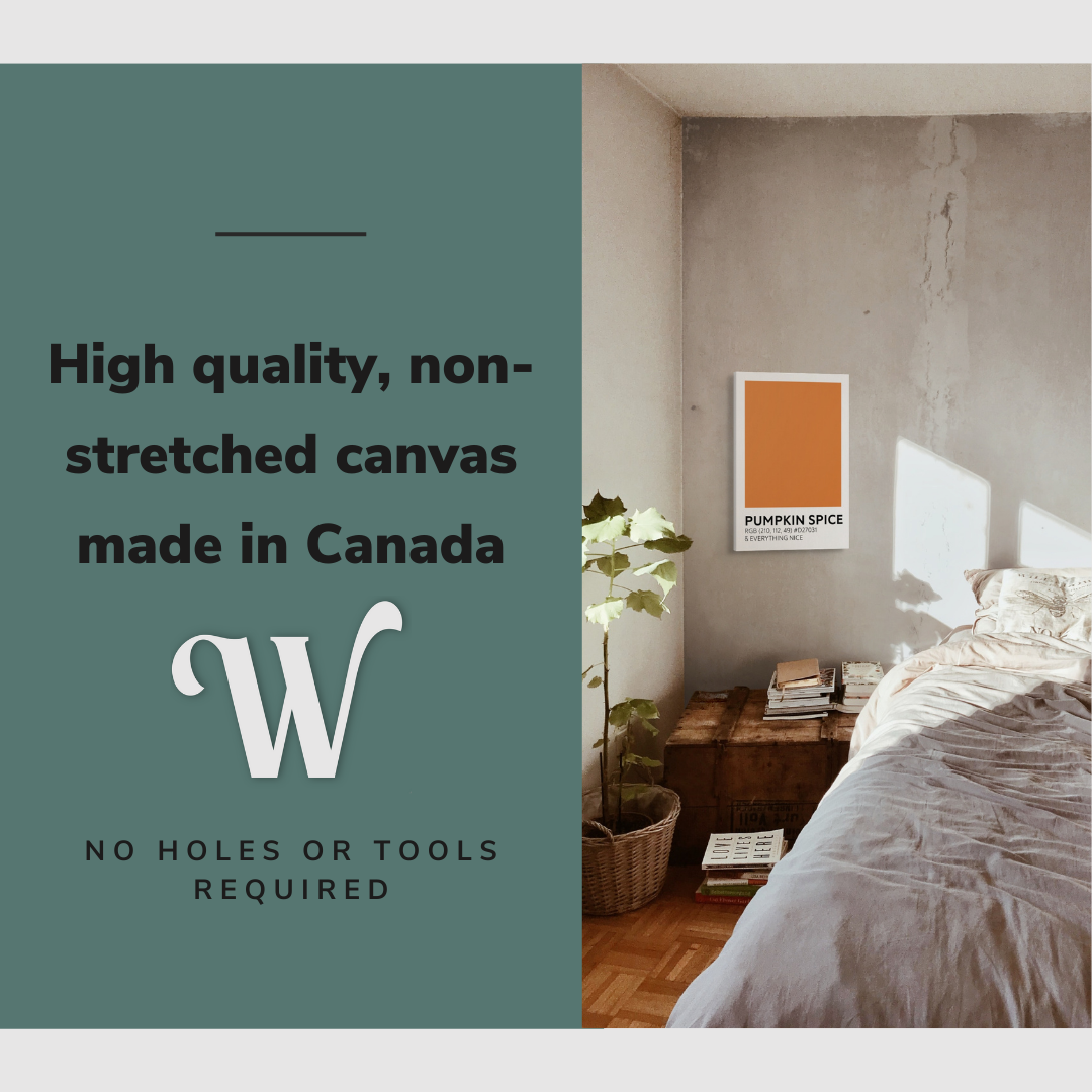 Lifestyle image of the vertical, 16x24 inch easy to hang canvas wall art hung in a cozy bedroom beside the bed and above the side table with graphic saying "High quality, non-stretched canvas made in Canada"