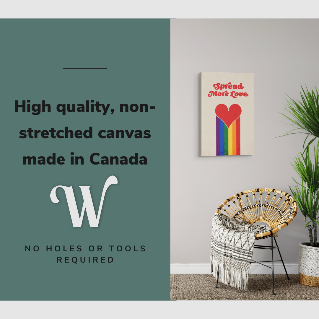 Lifestyle image of the vertical, 20x30 inch easy to hang canvas wall art hung in a minimalist hallway hung over an accent chair and a plant with graphic saying "High quality, non-stretched canvas made in Canada"