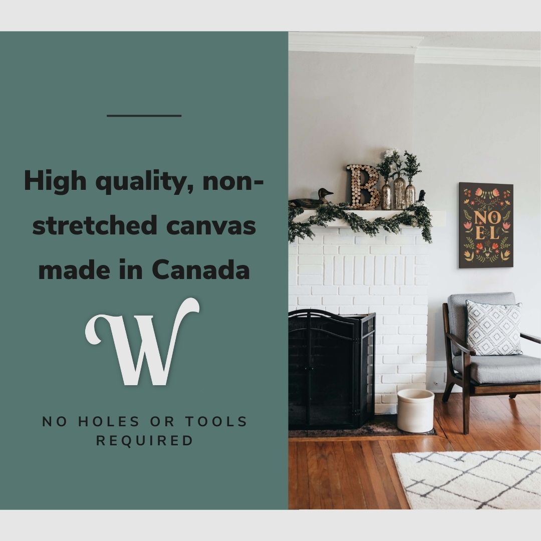 Lifestyle image of the vertical, 16x24 inch easy to hang canvas wall art hung in in a christmas decorated living room hung beside a fireplace above a chair with graphic saying "High quality, non-stretched canvas made in Canada"