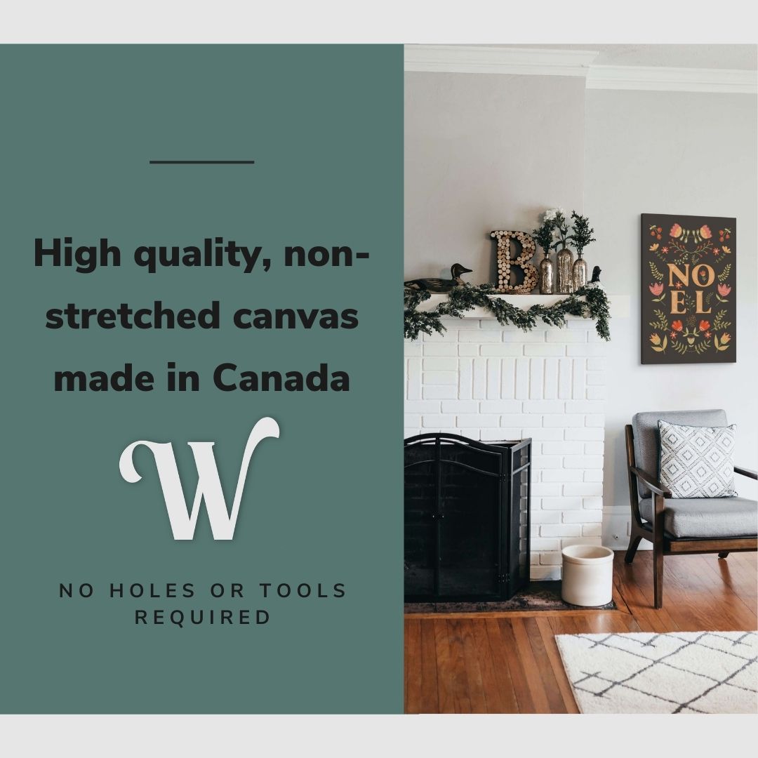 Lifestyle image of the vertical, 20x30 inch easy to hang canvas wall art hung in in a christmas decorated living room hung beside a fireplace above a chair with graphic saying "High quality, non-stretched canvas made in Canada"