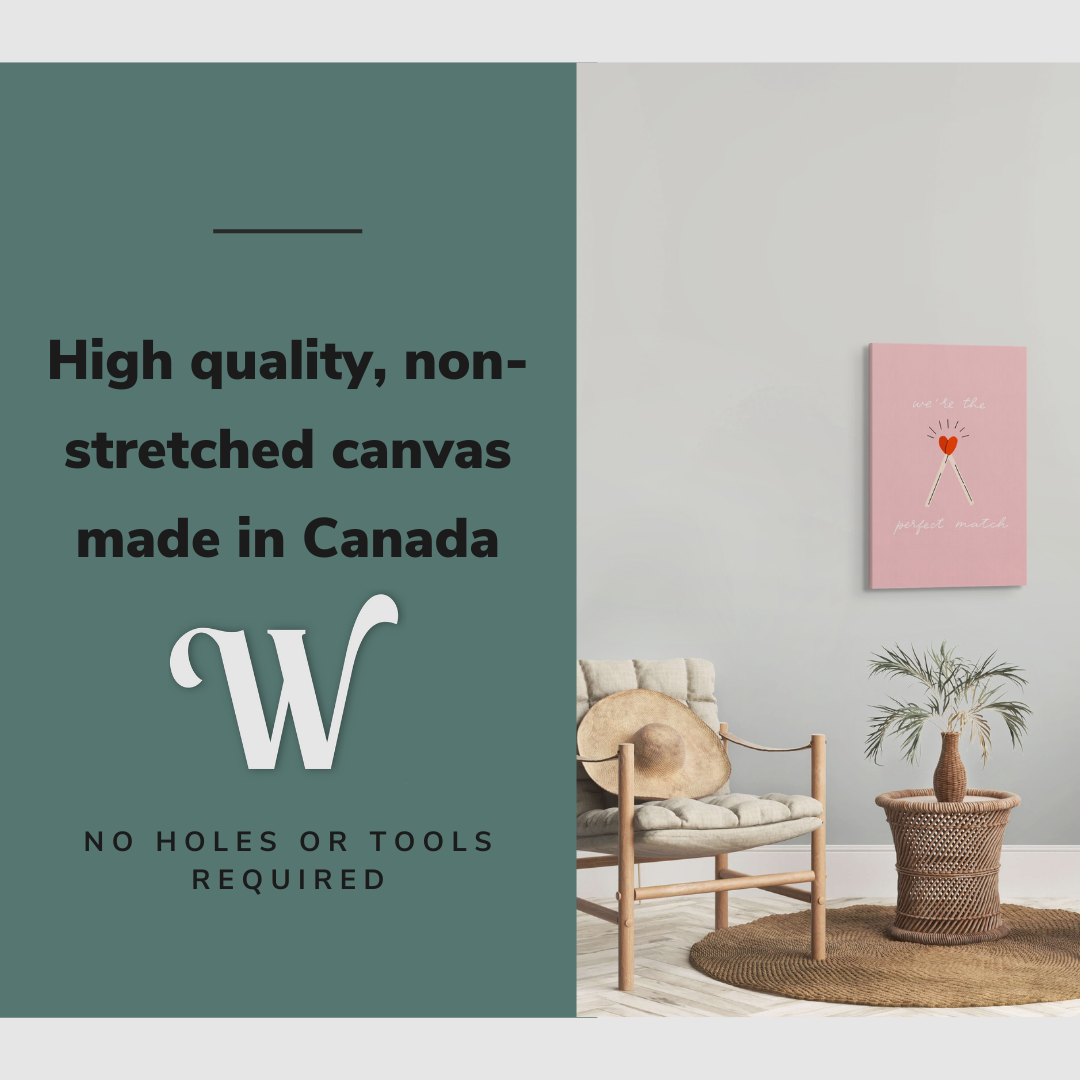 Lifestyle image of the vertical, 20x30 inch easy to hang canvas wall art hung in in a minimalist living room between two beige chairs with graphic saying "High quality, non-stretched canvas made in Canada"