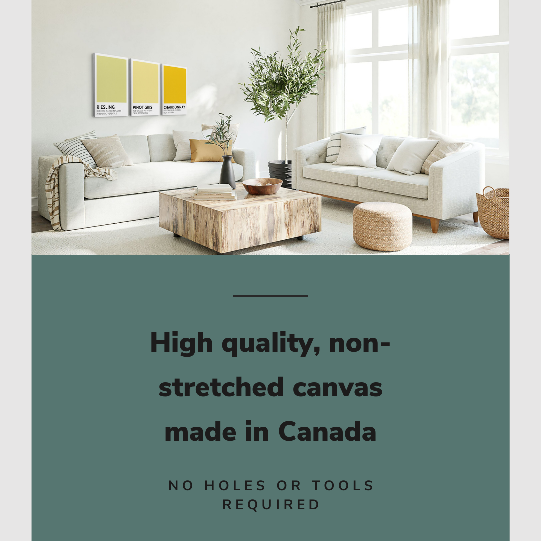 Lifestyle image of the vertical, 16x24 inch easy to hang canvas wall art hung in a living room above a couch and coffee table with graphic saying "High quality, non-stretched canvas made in Canada"