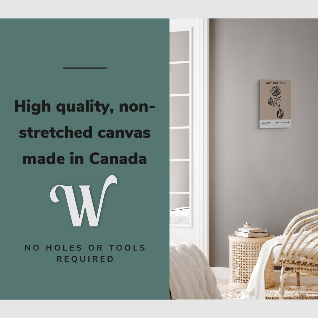 Lifestyle image of the vertical, 12x18 inch easy to hang canvas wall art hung in a bedroom above an accent chair with graphic saying "High quality, non-stretched canvas made in Canada"