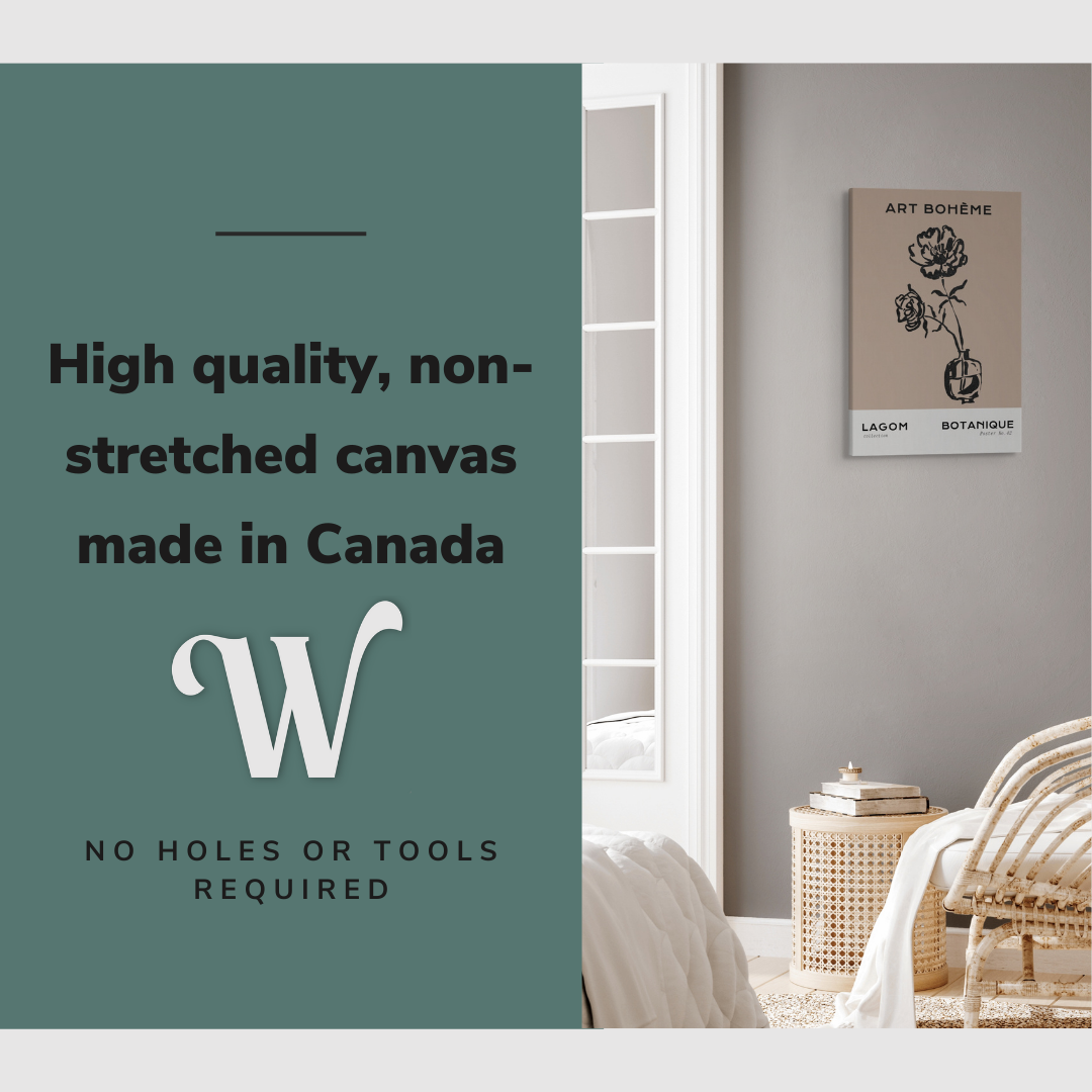 Lifestyle image of the vertical, 20x30 inch easy to hang canvas wall art hung in a bedroom above an accent chair with graphic saying "High quality, non-stretched canvas made in Canada"