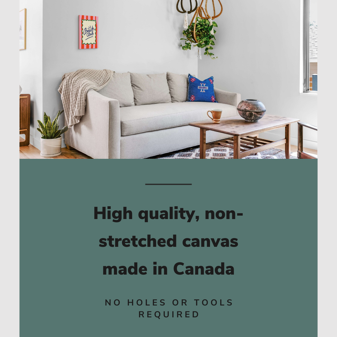 Lifestyle image of the vertical 12x18" inch easy to hang canvas wall art hung above a couch in a coastal styled living room with graphic saying "High quality, non-stretched canvas made in Canada"