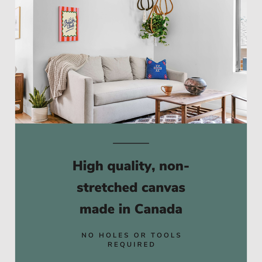 Lifestyle image of the vertical 16x24" inch easy to hang canvas wall art hung above a couch in a coastal styled living room with graphic saying "High quality, non-stretched canvas made in Canada"