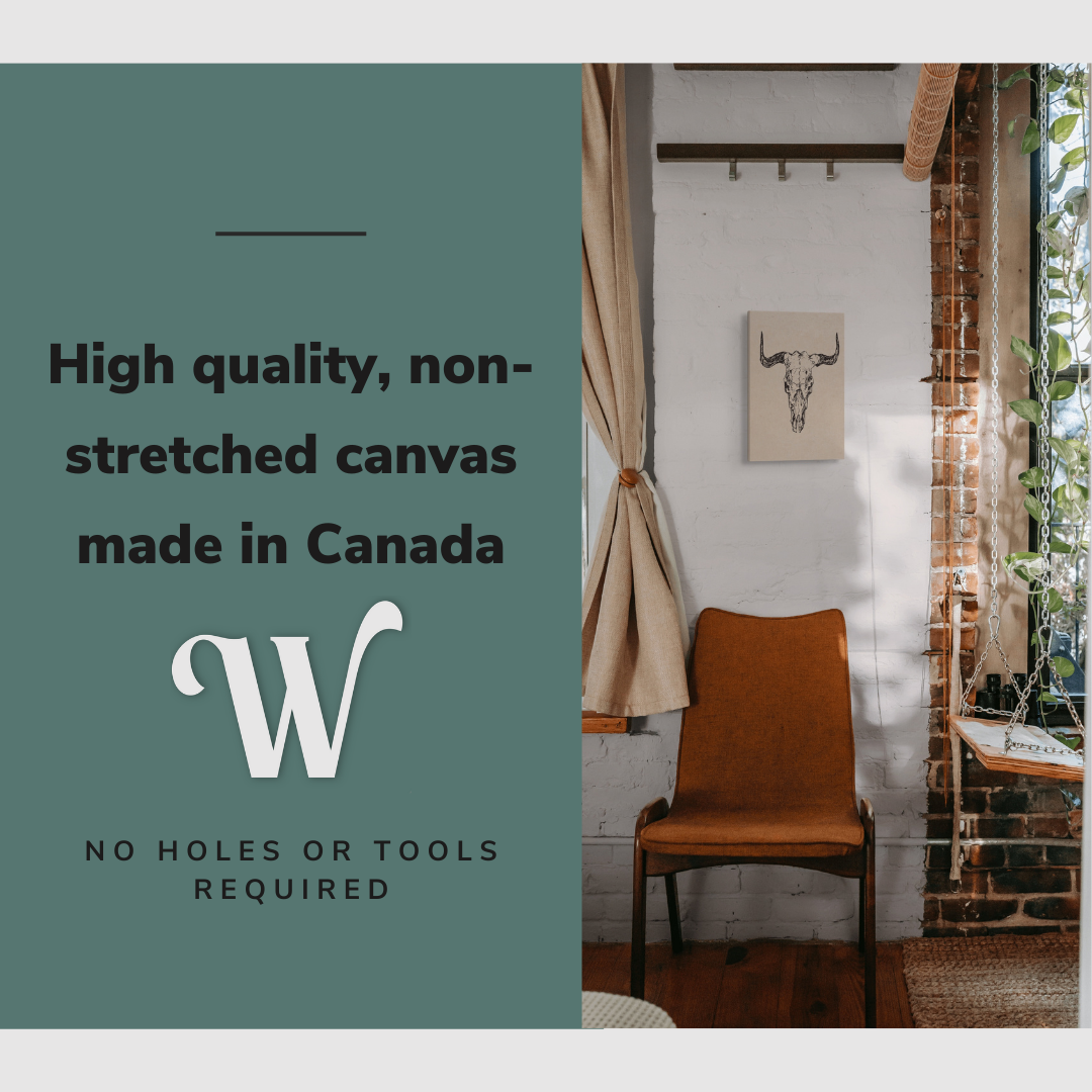 Lifestyle image of the vertical 12x18” inch easy to hang canvas wall art hung in a bedroom above a chair with graphic saying "High quality, non-stretched canvas made in Canada."