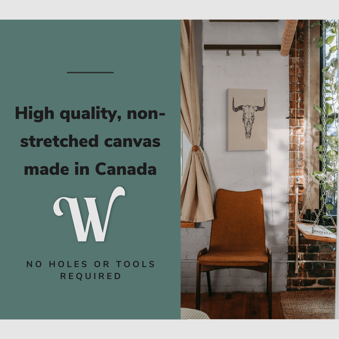 Lifestyle image of the vertical 16x24” inch easy to hang canvas wall art hung in a bedroom above a chair with graphic saying "High quality, non-stretched canvas made in Canada."