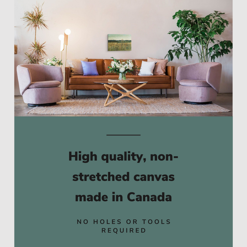 Lifestyle image of the vertical, 12x18 inch easy to hang canvas wall art hung in a living room above the couch and coffee table with graphic saying "High quality, non-stretched canvas made in Canada"