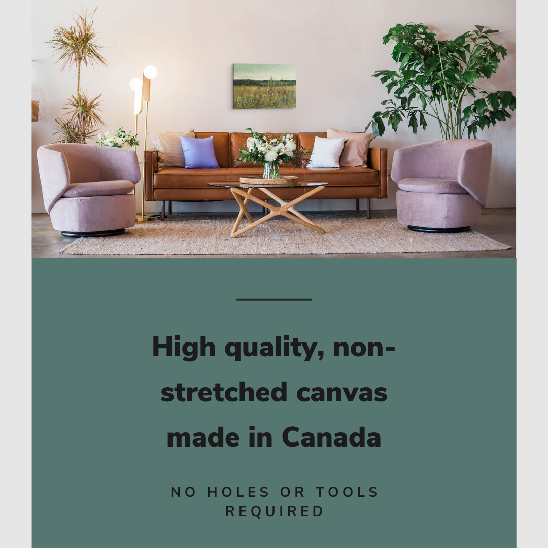 Lifestyle image of the vertical, 16x24 inch easy to hang canvas wall art hung in a living room above the couch and coffee table with graphic saying "High quality, non-stretched canvas made in Canada"