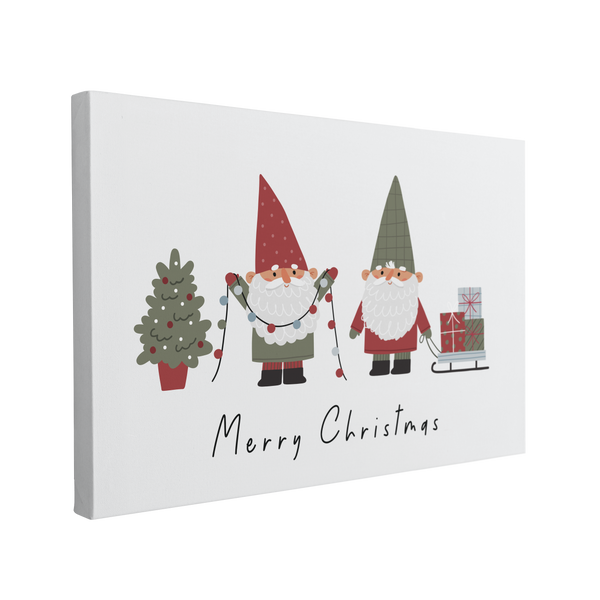 single, 2:3 horizontal easy to hang canvas print on a transparent background featuring an image of two cartoon christmas gnomes or elves, setting up christmas decorations together on a light grey background with words, "Merry Christmas" under them in black