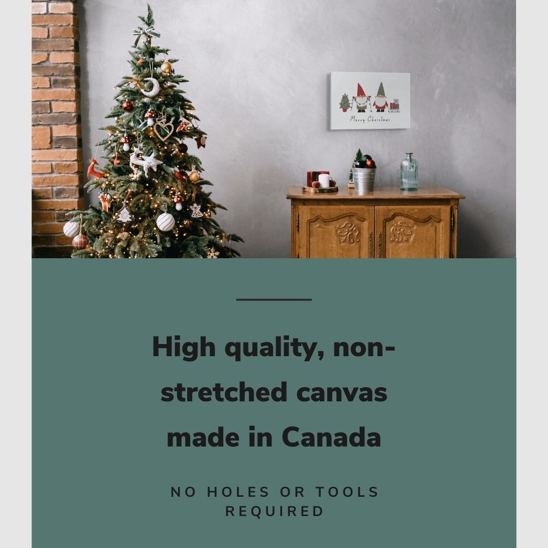 Lifestyle image of the vertical, 12x18 inch easy to hang canvas wall art hung in a christmas decorated living room above a credenza with graphic saying "High quality, non-stretched canvas made in Canada"