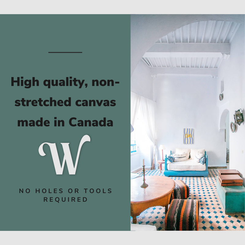 Lifestyle image of the vertical 12x18" inch easy to hang canvas wall art hung in a living room dining room space above a couch overlooking tables with graphic saying "High quality, non-stretched canvas made in Canada"