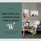 Lifestyle image of a vertical and a horizontal 16x24” inch easy to hang canvas wall art hung in a living room above a couch with graphic saying "High quality, non-stretched canvas made in Canada."hung