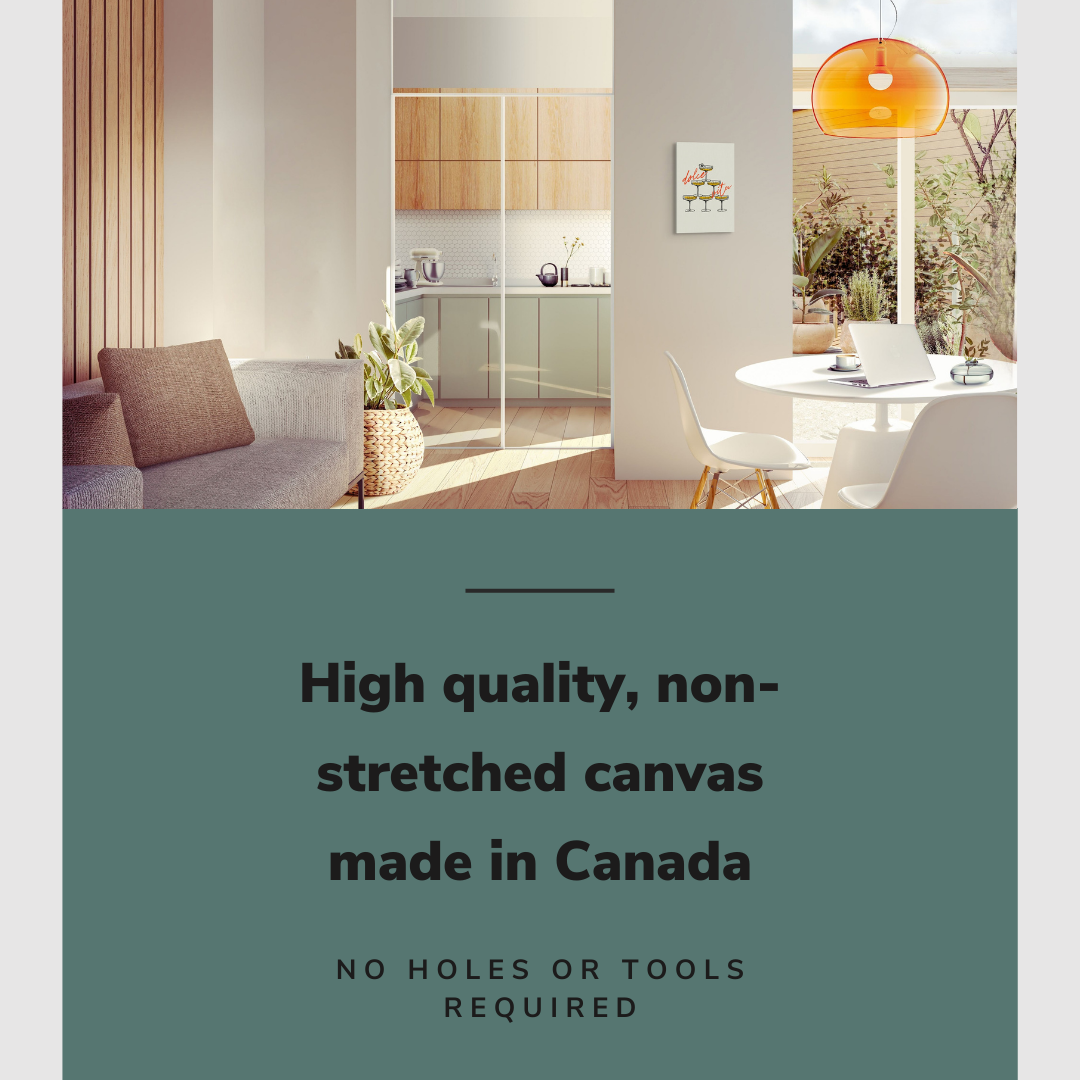 Lifestyle image of the 12x18" inch, vertical easy to hang canvas wall art hung in a chic living room overlooking a kitchen and dining room with graphic saying "High quality, non-stretched canvas made in Canada."