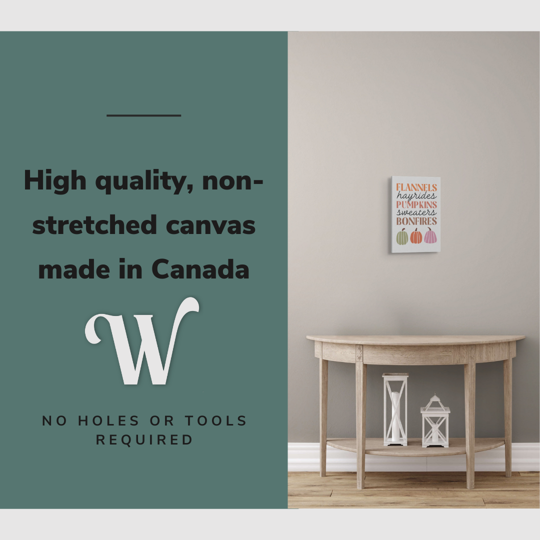 Lifestyle image of the vertical 12x18” inch easy to hang canvas wall art hung in a hallway above a table with graphic saying "High quality, non-stretched canvas made in Canada."