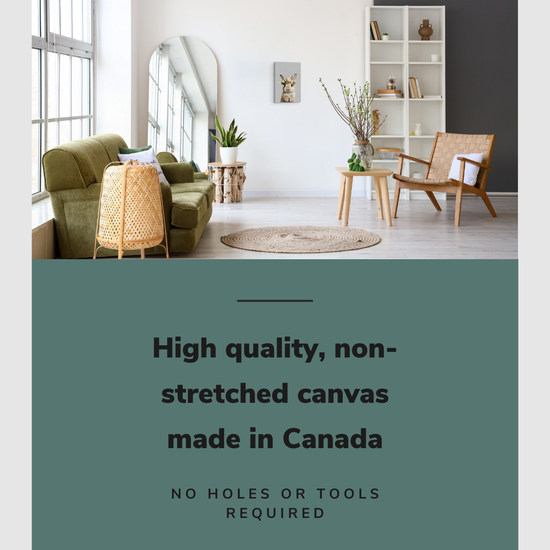 Lifestyle image of the vertical, 12x18 inch easy to hang canvas wall art hung in hung in a minimalist natural living room between a couch and an accent chair with graphic saying "High quality, non-stretched canvas made in Canada"