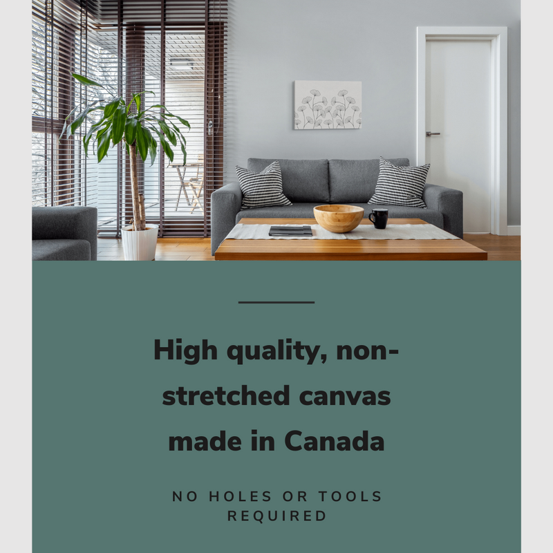 Lifestyle image of the horizontal 16x24” inch easy to hang canvas wall art hung in a living room above a chair with graphic saying "High quality, non-stretched canvas made in Canada."