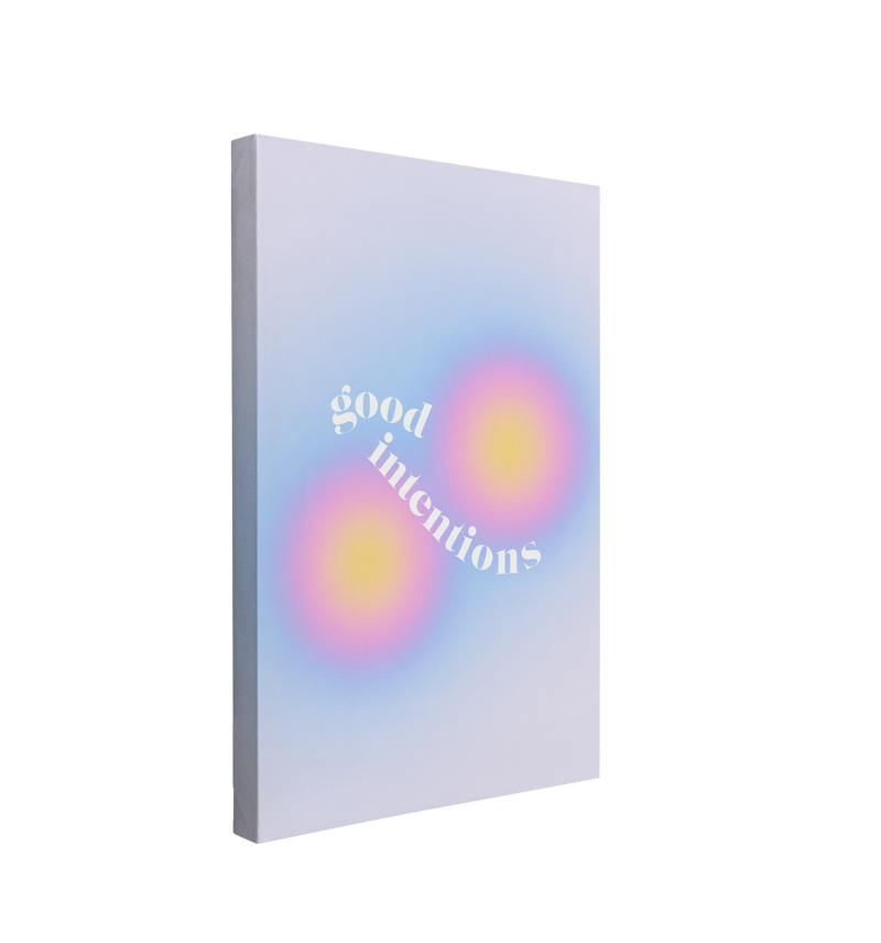 single, 2:3 vertical easy to hang canvas print on a transparent background featuring an image of two small gradient circles that start as yellow and merge into pink, purple then finally blue with words "good intentions" written in white between them