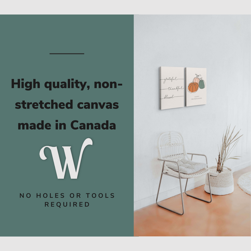 Lifestyle image of the vertical, 16x24” inch set of 2 easy to hang canvas wall art hung in a living room above a reading chair with graphic saying "High quality, non-stretched canvas made in Canada."