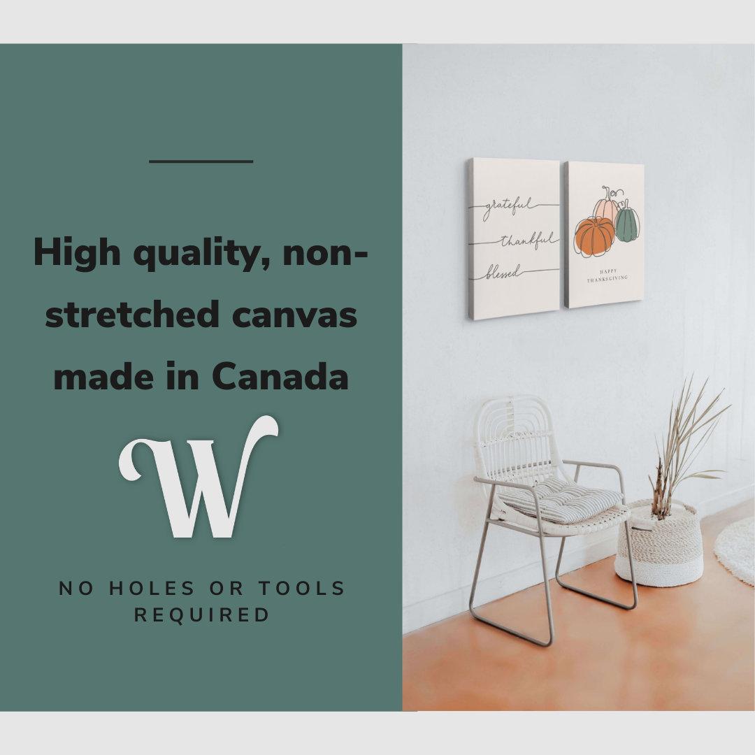 Lifestyle image of the vertical 20x30” inch set of 2 easy to hang canvas wall art hung in a living room above a reading chair with graphic saying "High quality, non-stretched canvas made in Canada"