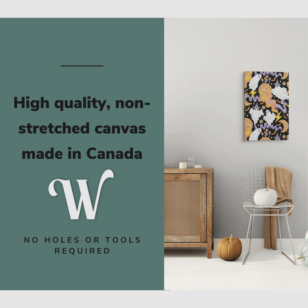 Lifestyle image of the vertical, 20x30” inch easy to hang canvas wall art hung in a Halloween decorated living room above a chair with graphic saying "High quality, non-stretched canvas made in Canada"