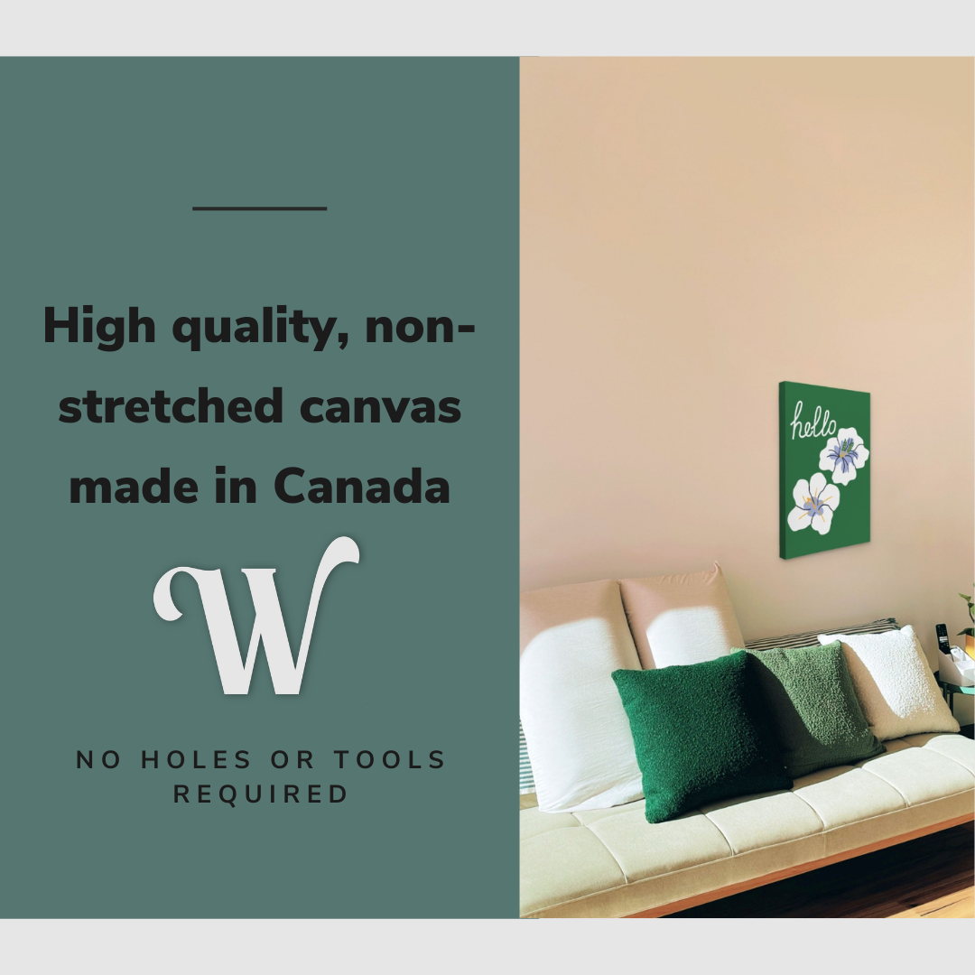 Lifestyle image of the vertical 16x24" inch easy to hang canvas wall art hung in a living room above a couch with graphic saying "High quality, non-stretched canvas made in Canada"