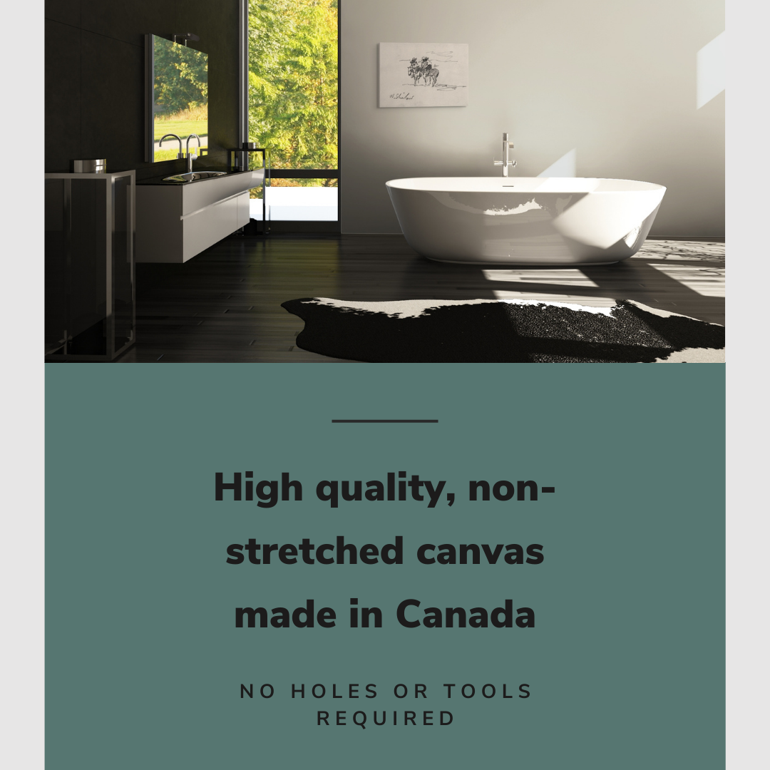 Lifestyle image of the horizontal, 20x30” inch easy to hang canvas wall art hung in a western styled bathroom above a bathtub with graphic saying "High quality, non-stretched canvas made in Canada"