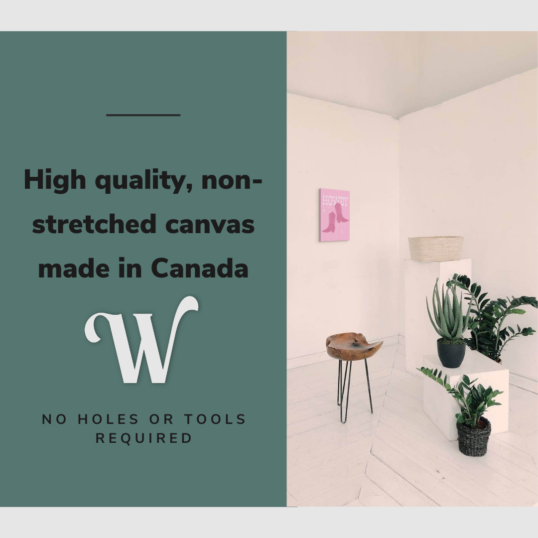 Lifestyle image of the vertical 12x18” inch easy to hang canvas wall art hung in a living room above some plants with graphic saying "High quality, non-stretched canvas made in Canada."