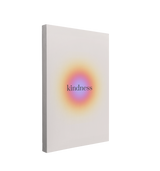 single, 2:3 vertical easy to hang canvas print on a transparent background featuring an image of a small gradient circle starting at a blue-purple in the middle and transitioning to an orange and yellow on a light beige background with the word, "Kindness" written on it in black. 