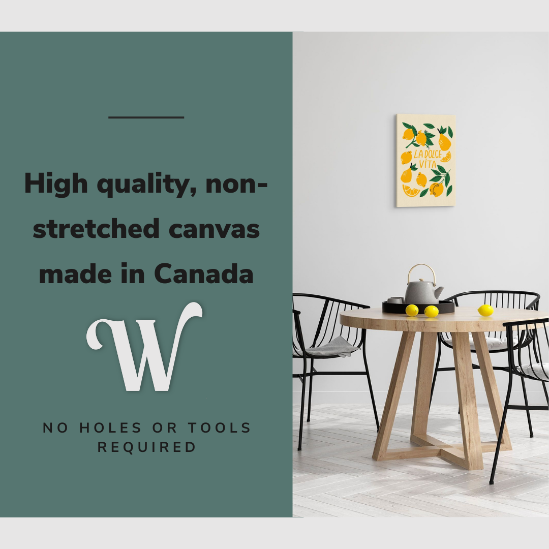 Lifestyle image of the vertical 16x24" inch easy to hang canvas wall art hung in a dining room above a dining table with lemons on it with graphic saying "High quality, non-stretched canvas made in Canada"