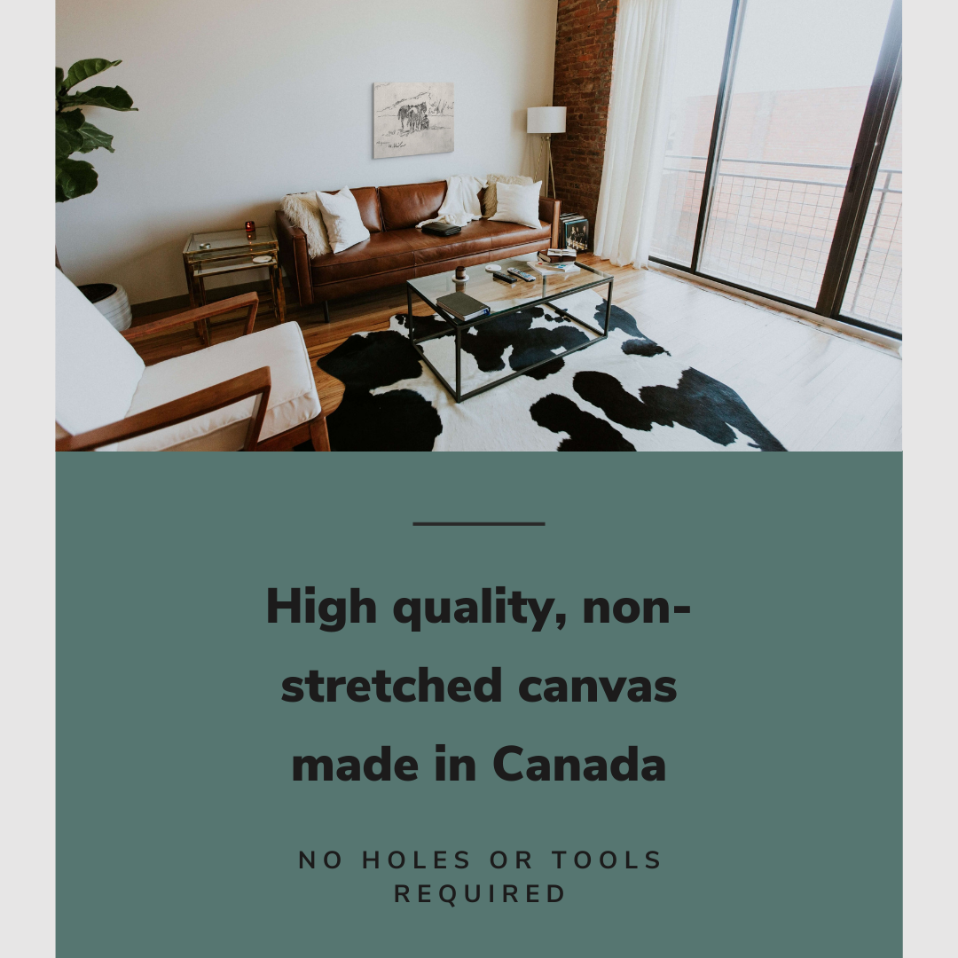 Lifestyle image of the horizontal, 20x30” inch easy to hang canvas wall art hung in a western living room above a couch with graphic saying "High quality, non-stretched canvas made in Canada"