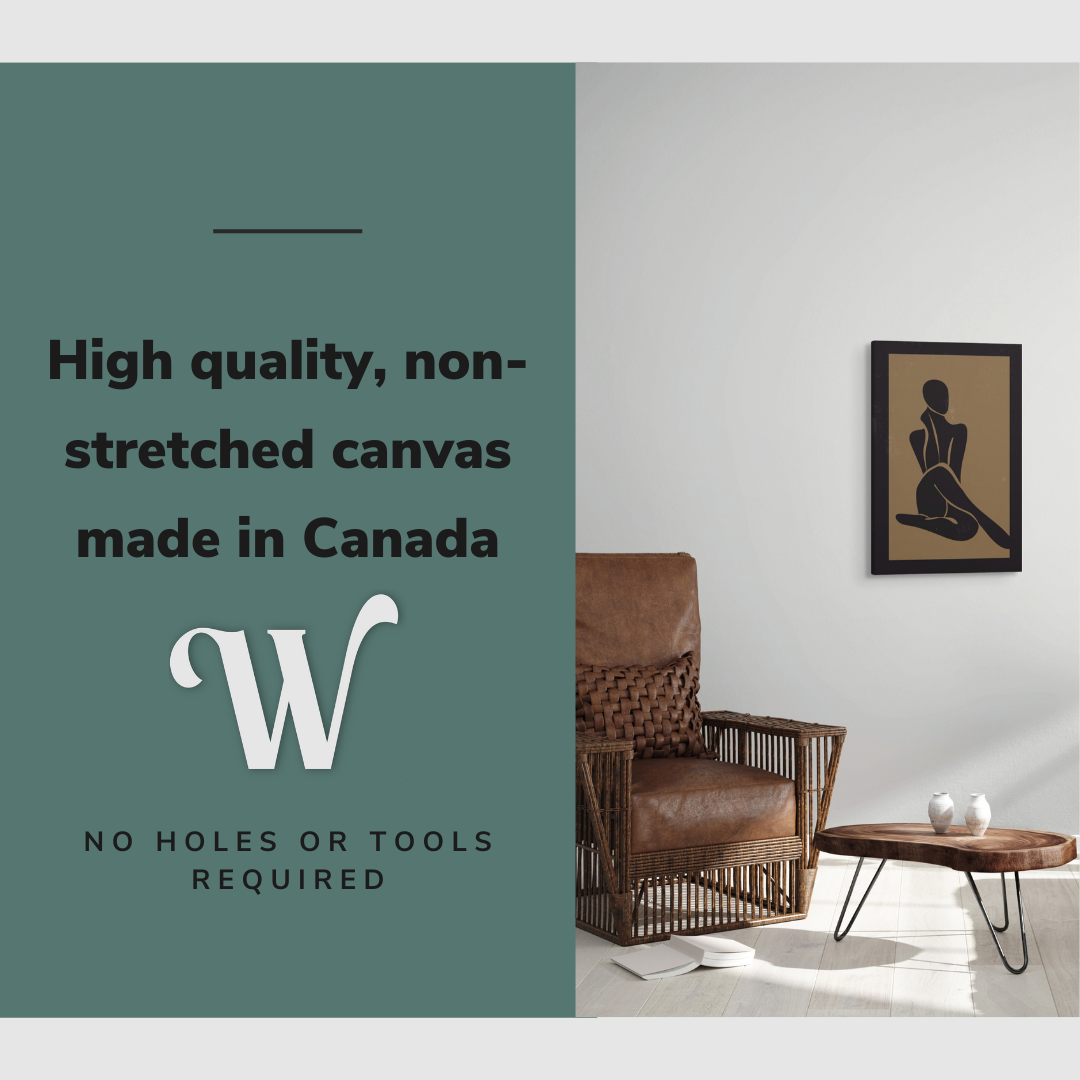 Lifestyle image of the vertical, 20x30” inch easy to hang canvas wall art hung in a living room above a chair and table with graphic saying "High quality, non-stretched canvas made in Canada"