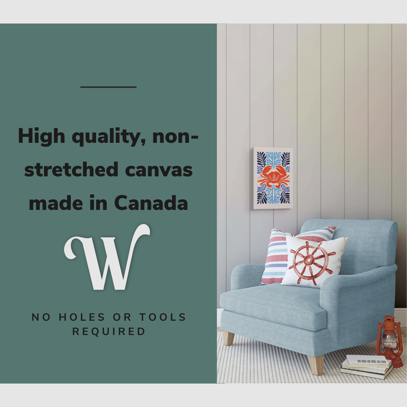 Lifestyle image of the vertical, 12x18” inch easy to hang canvas wall art hung in a coastal themed living room above a couch with graphic saying "High quality, non-stretched canvas made in Canada.