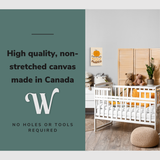 Lifestyle image of the vertical 12x18” inch easy to hang canvas wall art hung in an autumn themed nursery above the crib with graphic saying "High quality, non-stretched canvas made in Canada."